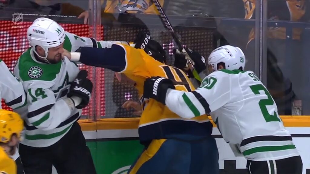 michael mccarron goes after jamie benn as he comes out of the box