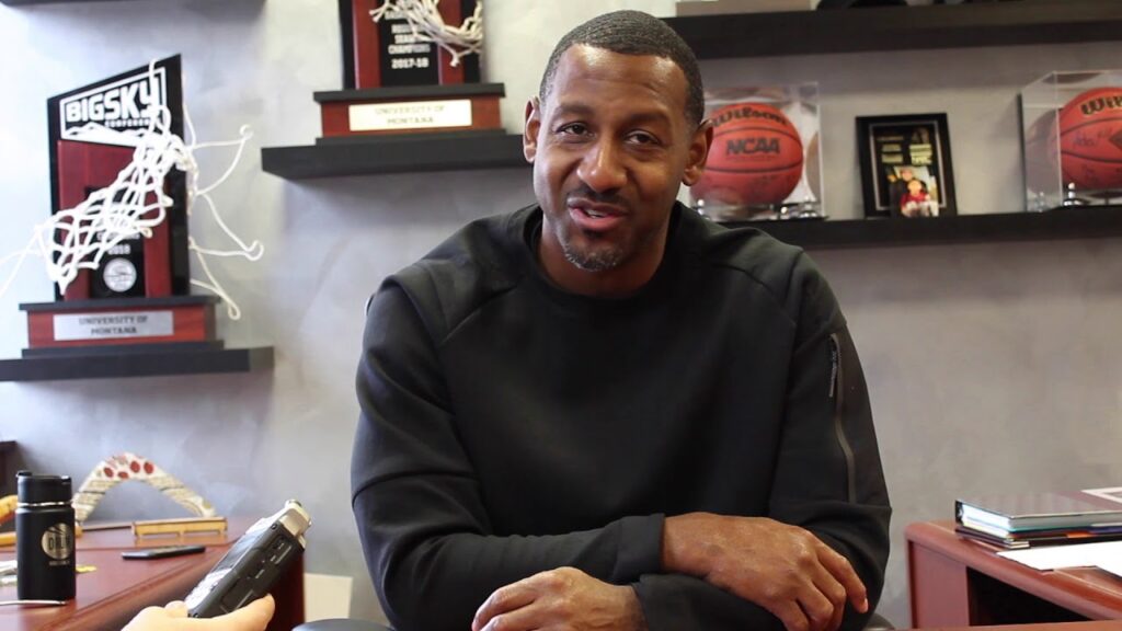 griz basketball montana head coach travis decuire