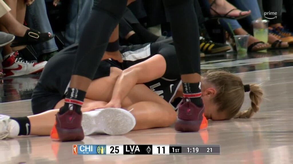 kate martin helped off vs sky after apparently leg injury wnba on espn